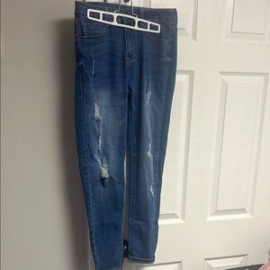 A. Women's Blue Distressed Jeans